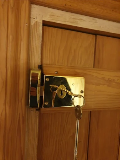 Brass mortice lock and keys fitted to a timber door in Carlisle